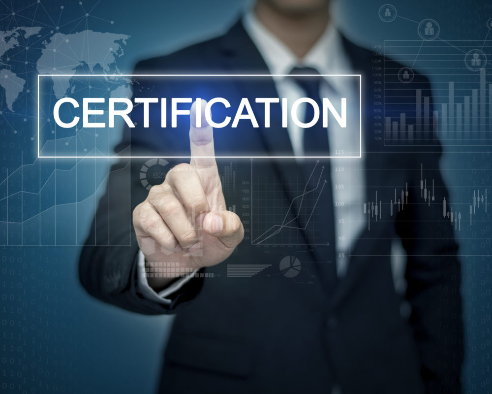 Businessman hand touching CERTIFICATION  button on virtual screen